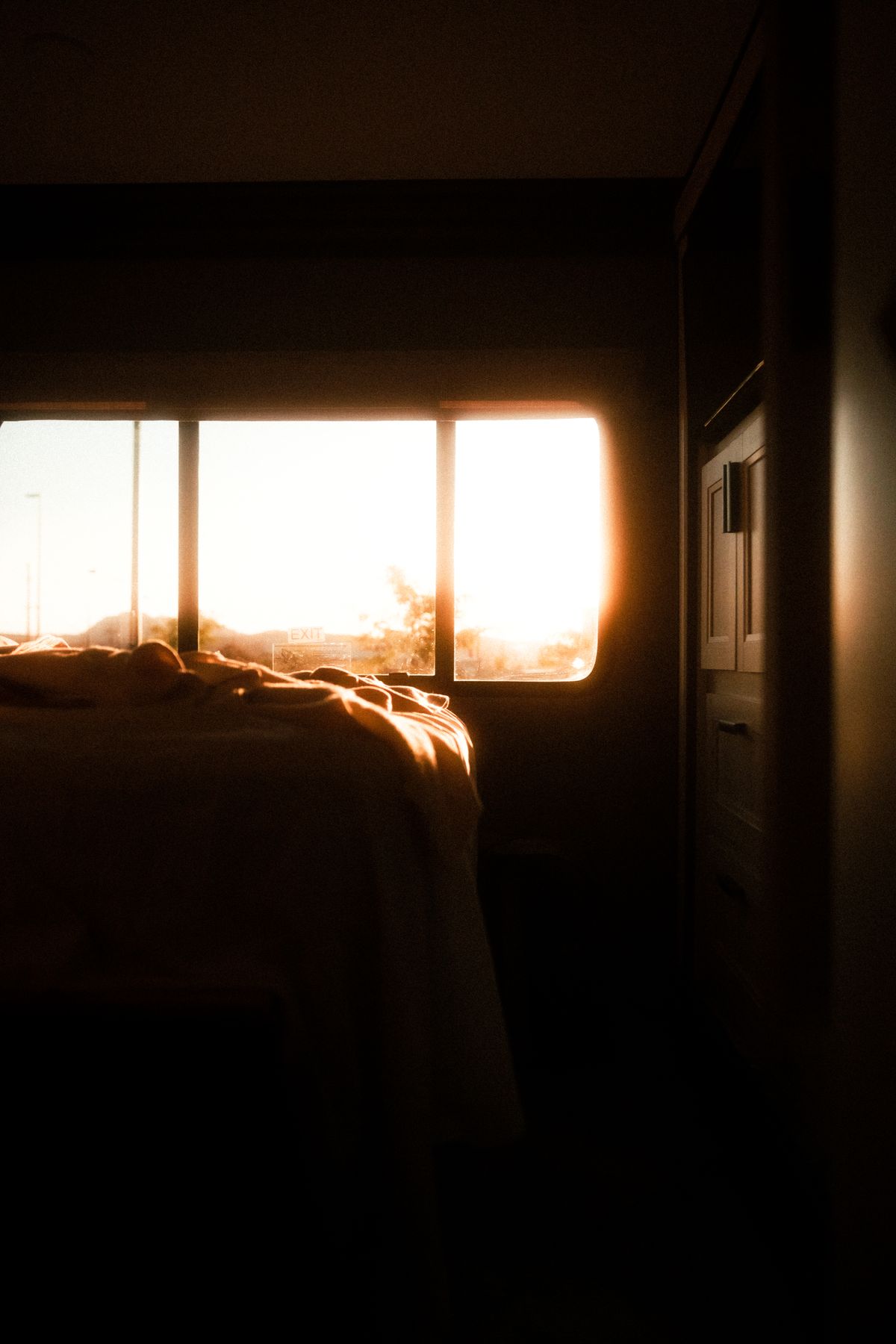Tranquil bedroom with morning sunlight for daily box breathing practice