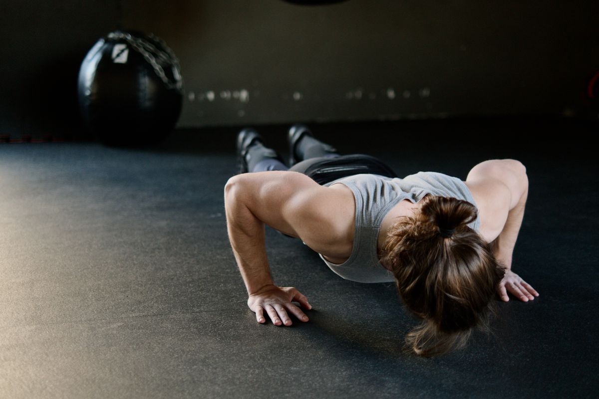 High protein pre-workout foods including Greek yogurt, eggs, and protein shake for muscle support during exercise